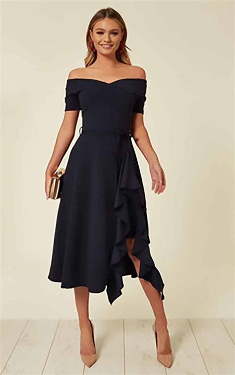 navy wedding guest outfit.